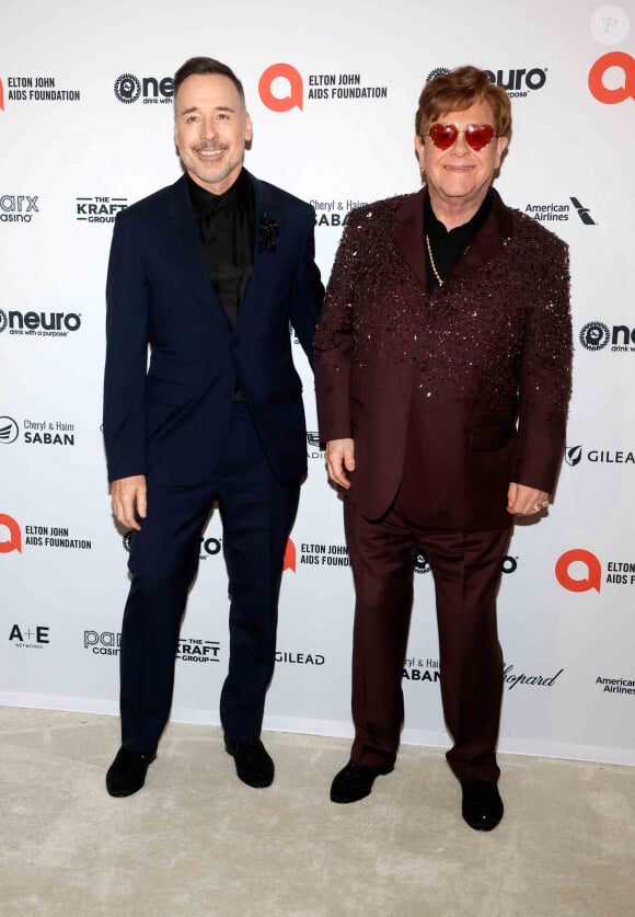 Un adieu à Paris mais pas à la France : avec son mari, Elton John vit dans le Sud de la France.
David Furnish, Elton John à la soirée "Elton John AIDS Foundation" lors de la 95ème édition de la cérémonie des Oscars à Los Angeles le 12 mars 2023. 