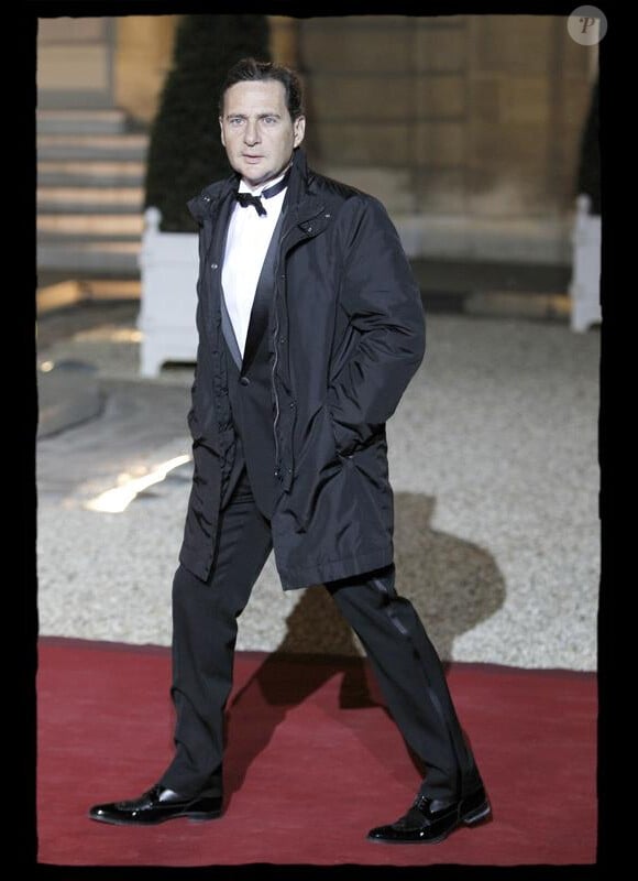Eric Besson arrive à l'Elysée pour un luxueux dîner d'Etat. 2/03/2010
