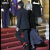 François Fillon, ses chaussettes rouges, et son épouse arrivent à l'Elysée pour un luxueux dîner d'Etat. 2/03/2010