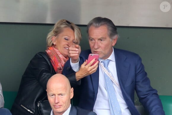 Sophie Davant et William Leymergie - People dans les tribunes des Internationaux de France de tennis de Roland Garros à Paris. Le 26 mai 2015