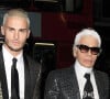 Une bonne nouvelle qui le sort un peu des histoires d'héritage de Karl Lagerfeld.
Karl Lagerfeld et Baptiste Giabiconi (blond platine) - Arrivée des people au vernissage de l'exposition "Mademoiselle Privé" à la Galerie Saatchi à Londres, le 12 octobre 2015. 