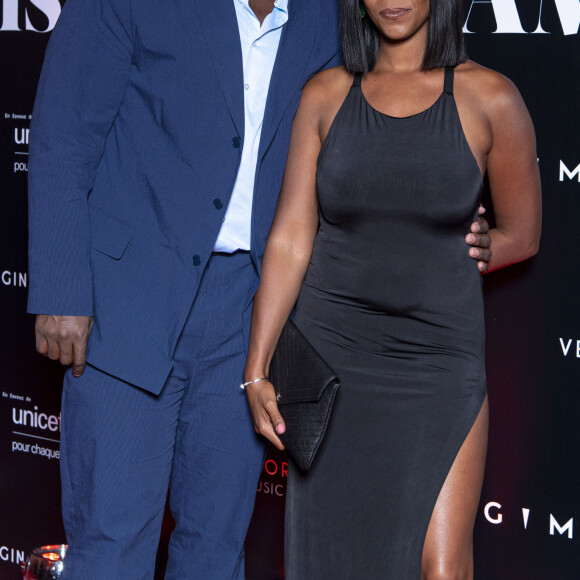 Teddy Riner et sa femme Luthna Plocus au photocall de la soirée "Unis comme jamais" au profit de l'Unicef, au pavillon Cambon à Paris. Le 8 novembre 2021. © Pierre Perusseau / Bestimage