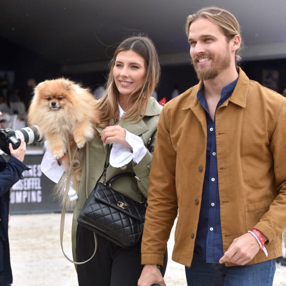 Camille Cerf, son compagnon Théo Fleury et le chien Romeo - 8ème édition du "Longines Paris Eiffel Jumping" au Champ de Mars à Paris, le 25 juin 2022. © Perusseau/Gorassini/Tribeca/Bestimage 