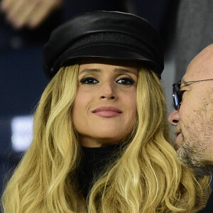 Pascal Obispo et son ex-femme Julie Hantson dans les tribunes lors du match retour de Champion's League "PSG - Bruges (1-0)" au Parc des Princes. Paris, le 6 novembre 2019. 