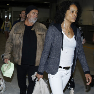 Luc Besson et Virginie Besson-Silla - Les célébrités arrivent à l'aéroport de Nice, à la veille du 76ème festival international du film de Cannes (16 - 27 mai 2023), le 15 mai 2023.