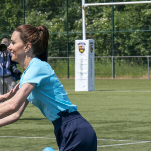 Et les soutient depuis longtemps.
Catherine Kate Middleton, princesse de Galles, participe à des exercices de rugby lors d'une visite au Maidenhead Rugby Club, dans le Berkshire, le 7 juin 2023. 