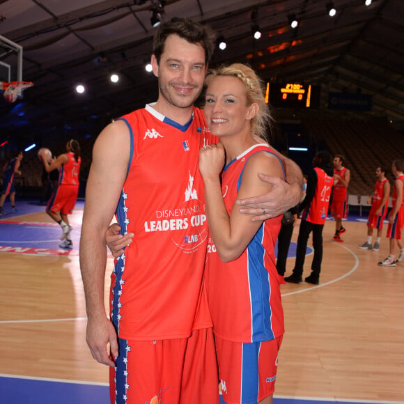 Elodie Gossuin et son mari Bertrand Lacherie - Match des célébrités (défi AG2R La Mondiale) au profit de l'association "Petits Princes" dans le cadre de la Disneyland Paris Leaders Cup LNB, compétition de basket qui réunit les 8 meilleures équipes de PRO A à la Disney Events Arena, le 20 février 2016. © Veeren/Bestimage