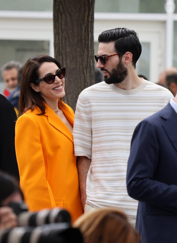 Sofia Essaïdi et son compagnon Adrien Galo s'embrassent en marge du Photocall du film "Nostalgia" lors du 75ème Festival International du Film de Cannes, e 25 mai 2022. © Dominique Jacovides / Bestimage 