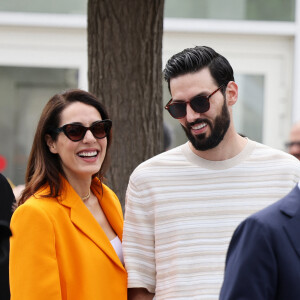 Sofia Essaïdi et son compagnon Adrien Galo s'embrassent en marge du Photocall du film "Nostalgia" lors du 75ème Festival International du Film de Cannes, e 25 mai 2022. © Dominique Jacovides / Bestimage 