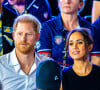 Il était aussi très tactile avec sa femme Meghan 
Le prince Harry, duc de Sussex et Meghan Markle, duchesse de Sussex, assistent à la finale de natation lors des Invictus Games 2023 à Dusseldorf, le 13 septembre 2023. 