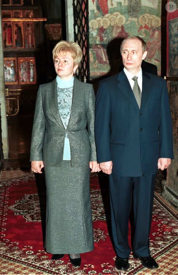 Le président russe a été marié officiellement jusqu'en 2013 avec Lioudmila, mère de ses deux aînées
Vladimir Poutine et sa femme Lyudmila