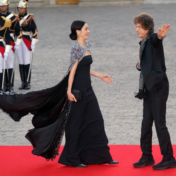 Mick Jagger et sa compagne Melanie Hamrick - Dîner d'Etat au château de Versailles en l'honneur de la visite officielle du roi Charles III d'Angleterre et de la reine consort Camilla Parker Bowles de 3 jours en France. Le 20 septembre 2023.