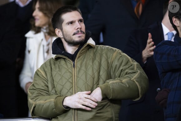 François Civil - People dans les tribunes lors du match de ligue des champions entre le PSG et l'AC Milan au Parc des Princes à Paris le 25 octobre 2023. © Cyril Moreau/Bestimage