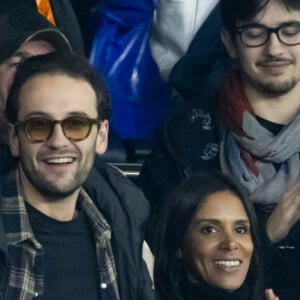 La chanteuse Shy'm et son nouvel ami Keziah Derard - People dans les tribunes lors du match de ligue des champions entre le PSG et l'AC Milan au Parc des Princes à Paris le 25 octobre 2023. © Cyril Moreau/Bestimage