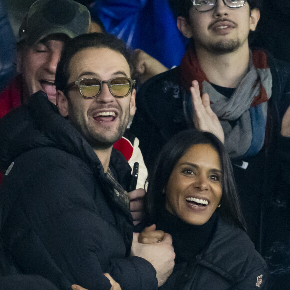 La chanteuse Shy'm et son nouvel ami Keziah Derard - People dans les tribunes lors du match de ligue des champions entre le PSG et l'AC Milan au Parc des Princes à Paris le 25 octobre 2023. © Cyril Moreau/Bestimage