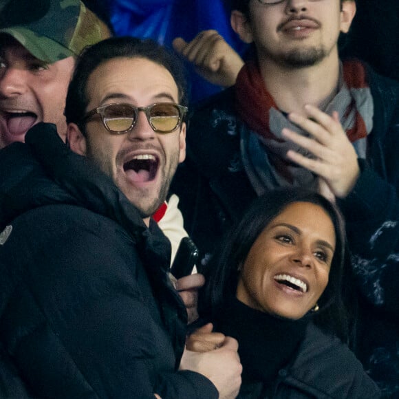 La chanteuse Shy'm et son nouvel ami Keziah Derard - People dans les tribunes lors du match de ligue des champions entre le PSG et l'AC Milan au Parc des Princes à Paris le 25 octobre 2023. © Cyril Moreau/Bestimage