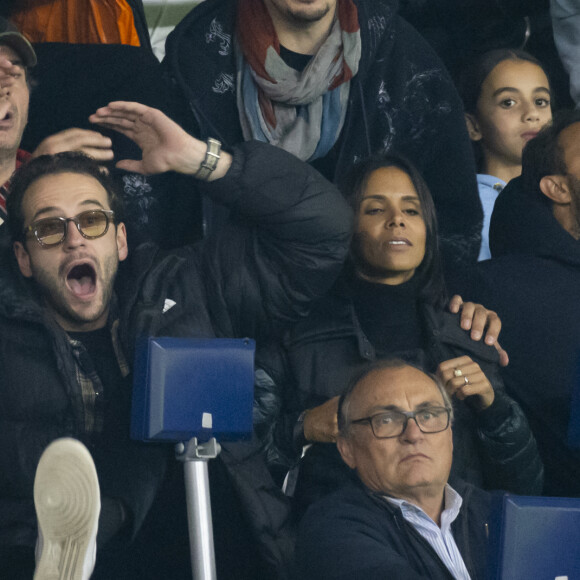 La chanteuse Shy'm et son nouvel ami Keziah Derard - People dans les tribunes lors du match de ligue des champions entre le PSG et l'AC Milan au Parc des Princes à Paris le 25 octobre 2023. © Cyril Moreau/Bestimage