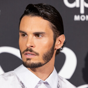 Baptiste Giabiconi - Photocall de la première édition du dîner de charité "Together we Give" sur la Plage "La Môme"lors du 76ème Festival International du Film de Cannes le 23 mai 2023. © Jeremy Melloul/Bestimage