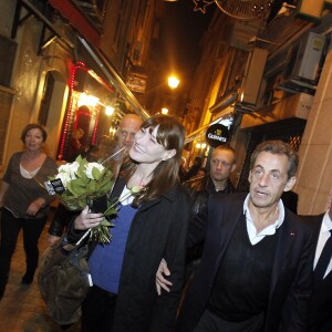 Exclusif - Nicolas Sarkozy et sa femme Carla Bruni sont allés dîner au restaurant "Aux Bons Enfants" à Cannes pour fêter la Saint Valentin, après le concert de Carla Bruni au palais des festivals à Cannes. Le couple était accompagné du président du conseil général des Alpes-Maritimes Éric Ciotti et le député David Lisnard. Le 14 février 2014