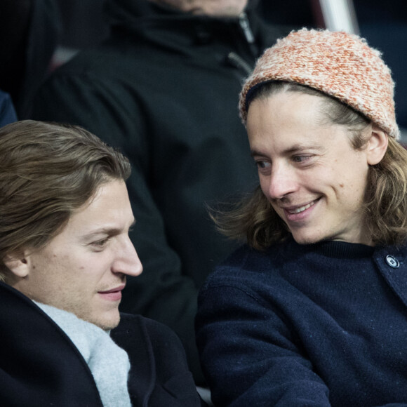 Pierre Sarkozy, Jean Sarkozy dans les tribunes lors du match de Champions League "PSG - Galatasaray (5-0)" au Parc des Princes à Paris, le 11 décembre 2019. © Cyril Moreau/Bestimage