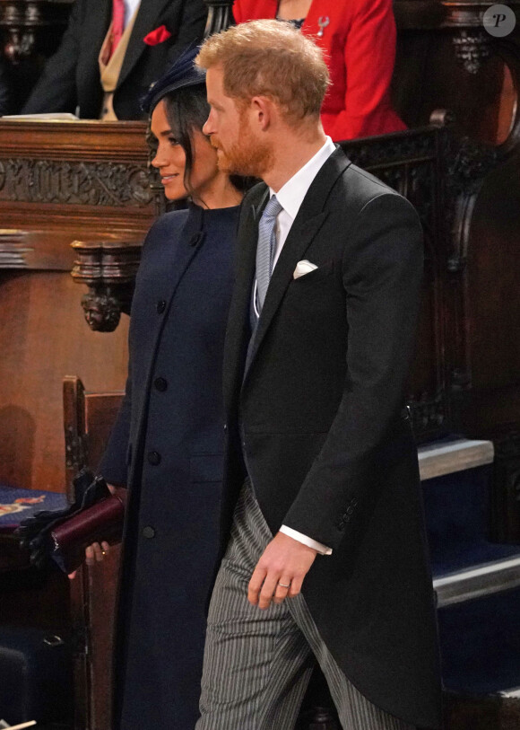 Les membres de la famille royale ont en effet interdiction d'accepter les cadeaux.
Le prince Harry, duc de Sussex, et Meghan Markle, duchesse de Sussex - Cérémonie de mariage de la princesse Eugenie d'York et Jack Brooksbank en la chapelle Saint-George au château de Windsor, Royaume Uni le 12 octobre 2018. 