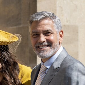 George Clooney et sa femme Natacha - Les invités arrivent à la chapelle St. George pour le mariage du prince Harry et de Meghan Markle au château de Windsor, le 19 mai 2018. 