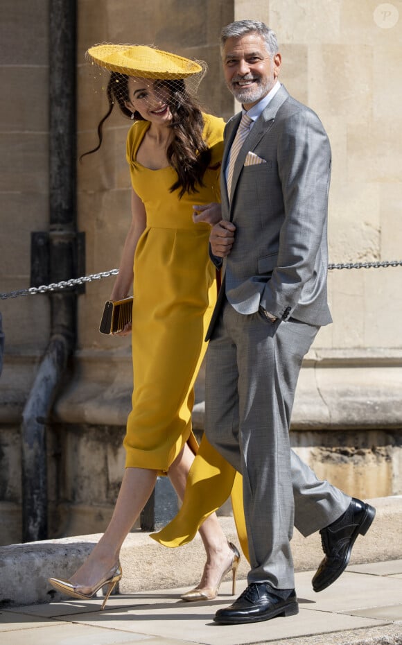 George Clooney et sa femme Natacha - Les invités arrivent à la chapelle St. George pour le mariage du prince Harry et de Meghan Markle au château de Windsor, le 19 mai 2018. 