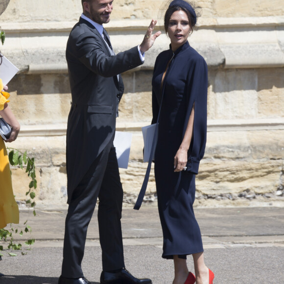 David Beckham et sa femme Victoria - Les invités à la sortie de la chapelle St. George au château de Windsor, Royaume Uni, le 19 mai 2018. 