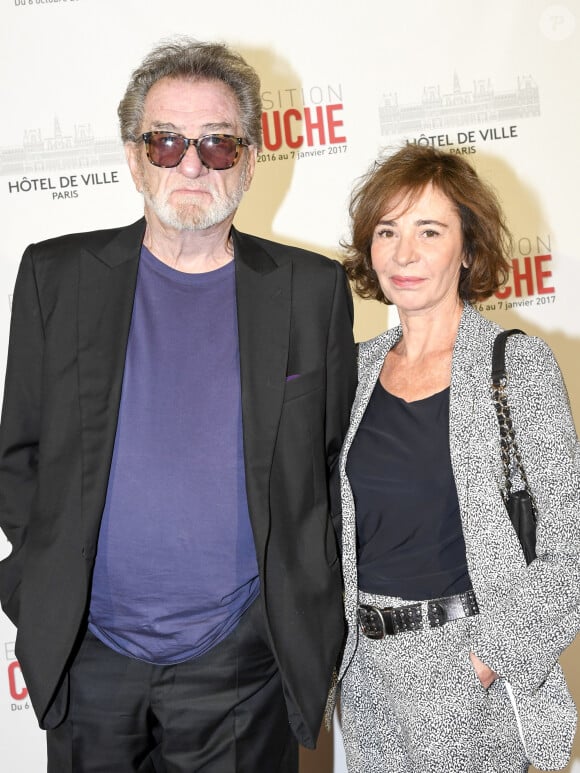 Eddy Mitchell et sa femme Muriel Bailleul - Vernissage presse de l'exposition "Coluche" à l'Hôtel de Ville de Paris le 5 octobre 2016. © Pierre Perusseau/Bestimage