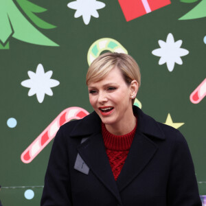 La princesse Charlène de Monaco - Remise de cadeaux de Noël aux enfants de la principauté dans la cour d'honneur du palais de Monaco, le 20 décembre 2023. © JC Vinaj / Pool / Bestimage 