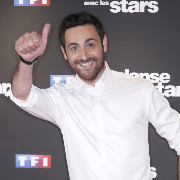 Alors que TF1 vient de confirmer trois personnalités au casting de la prochaine saison de "Danse avec les stars", Purepeople.com vous révèle aujourd'hui de nouveaux noms.
Camille Combal - Photocall de la saison 9 de l'émission "Danse avec les stars" (DALS) au siège de TF1 à Boulogne-Billancourt. © Christophe Aubert via Bestimage