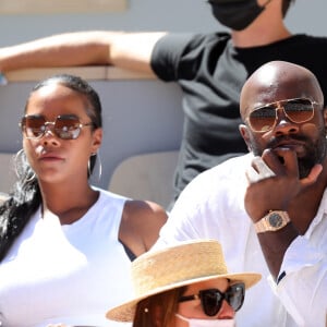 Teddy Riner et sa femme Luthna Plocus dans les tribunes lors de la finale hommes des Internationaux de France de tennis de Roland Garros à Paris le 13 juin 2021. © Dominique Jacovides / Bestimage