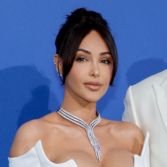 Nabilla Vergara est connue pour sa participation à des émissions de télé-réalité.
Nabilla Benattia et son mari Thomas Vergara - Photocall du gala de l'AmFar à l'Hôtel du Cap-Eden-Roc, Antibes, lors du Festival International du Film de Cannes. © Moreau-Jacovides / Bestimage