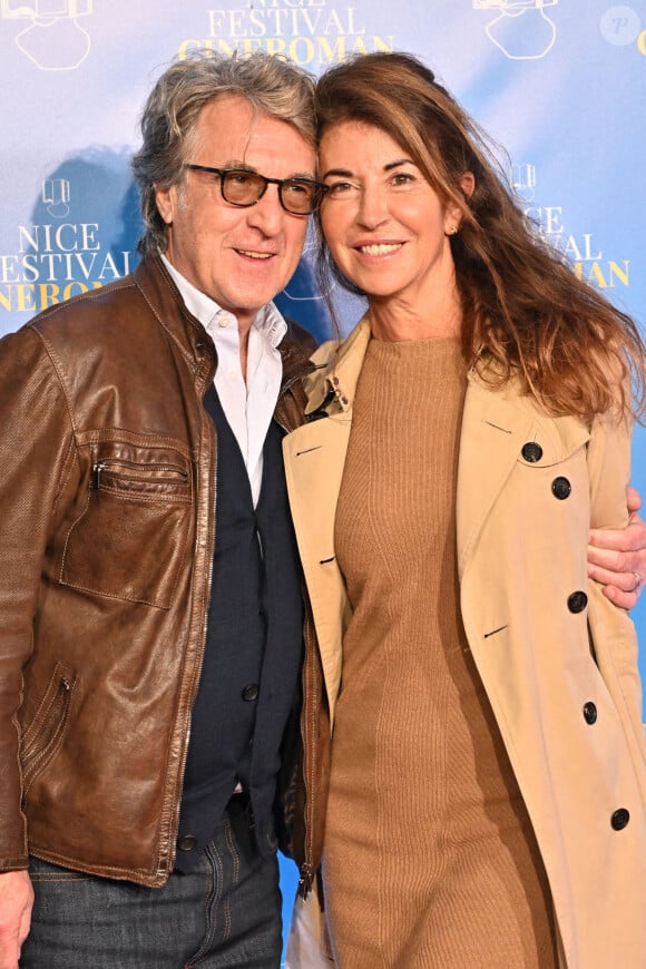 François Cluzet et sa femme Narjiss Slaoui-Falcoz au photocall de la soirée du 8 octobre lors de la 4ème édition du festival Cinéroman à Nice. © Bruno Bebert / Bestimage