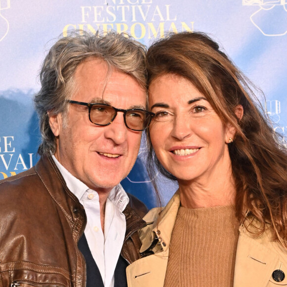 François Cluzet et sa femme Narjiss Slaoui-Falcoz au photocall de la soirée du 8 octobre lors de la 4ème édition du festival Cinéroman à Nice. © Bruno Bebert / Bestimage