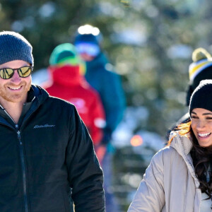 Le prince Harry, duc de Sussex et Meghan Markle, duchesse de Sussex, en visite au camp d'entrainement des athlètes des Invictus Games 2024 à Whistler en Colombie Britannique, le 14 février 2024. 