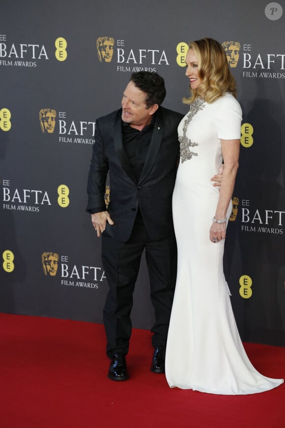 Michael J. Fox et son épouse Tracy Pollan - 77e cérémonie des British Academy of Film and Television Arts Awards au Royal Festival Hall de Londres. Le 18 février 2024.