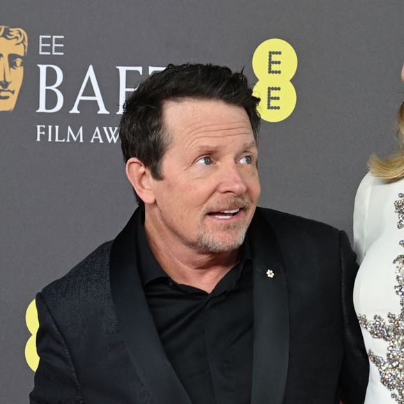 Sa venue aux BAFTA 2024 a ému de nombreuses personnes dans l'assemblée.
Michael J. Fox et son épouse Tracy Pollan - 77e cérémonie des British Academy of Film and Television Arts Awards au Royal Festival Hall de Londres. Le 18 février 2024.