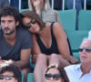 "Sortez moi de là" a-t-il écrit en plaisantant en légende de son post
Laure Manaudou et Jérémy Frérot (du groupe Fréro Delavega) dans les tribunes lors de la finale des Internationaux de tennis de Roland-Garros à Paris, le 7 juin 2015.