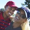 Le grand Tiger Woods dans les bras de sa femme Erin Nordegren.