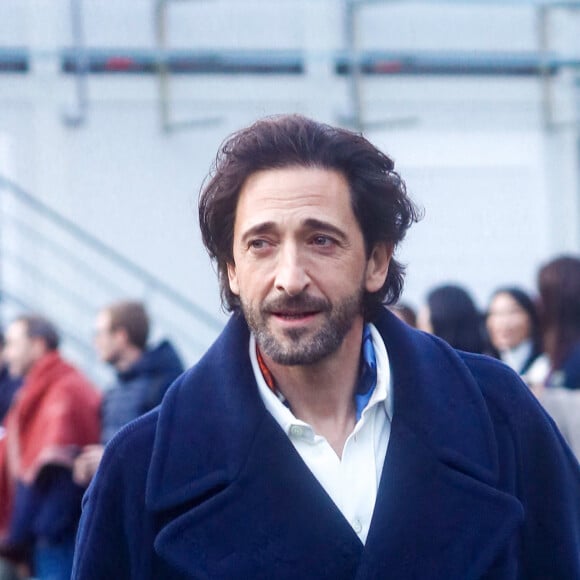 Adrien Brody - Arrivées au défilé Lacoste mode femme automne / hiver 2024-2025 au stade Roland-Garros lors de la Fashion Week de Paris (PFW), à Paris, France, le 5 mars 2024. © Christophe Clovis/Bestimage