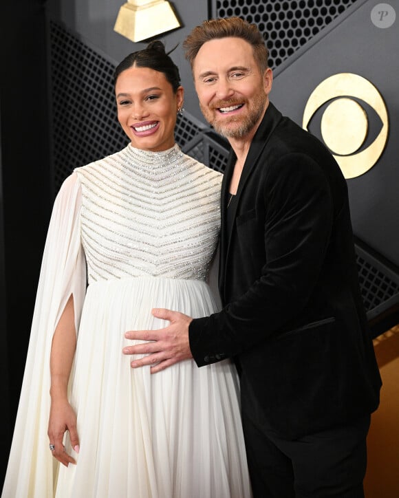 David Guetta et sa compagne Jessica Ledon, enceinte - Arrivées à la 66ème édition des Grammy Awards à la Crypto.com Arena à Los Angeles le 4 février 2024.