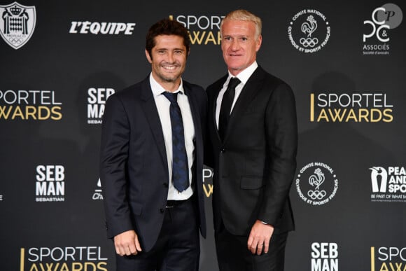 Bixente Lizarazu et Didier Deschamps, sélectionneur et ancien joueur de l'équipe de France de football, durant la soirée des Sportel Awards 2018 au Grimaldi Forum à Monaco le 23 octobre 2018. Les Sportel Awards sont une compétition internationale visant à récompenser les plus belles images de sport de l'année dans le cadre du Sportel qui est un salon international du sport et des médias qui se déroule sur 3 jours en Principauté. © Bruno Bebert/Bestimage  The 2018 Sportel Awards at the Grimaldi Forum in Monaco on 23 October 2018. The Sportel Awards are an international competition to reward the most beautiful sports images of the year as part of Sportel, an international sport and media fair. which takes place over 3 days in the Principality.