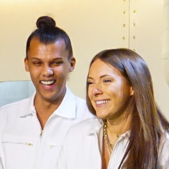 Stromae et sa femme Coralie Barbier ( enceinte) - Le chanteur Stromae, sa femme Coralie Barbier (styliste) et son frère Luc Junior Tam (directeur artistique) sont venus présenter au Bon Marché la 5 ème collection de vêtements de leur marque Moseart ( label créatif créé par Stromae - de son vrai nom Paul Van Haver