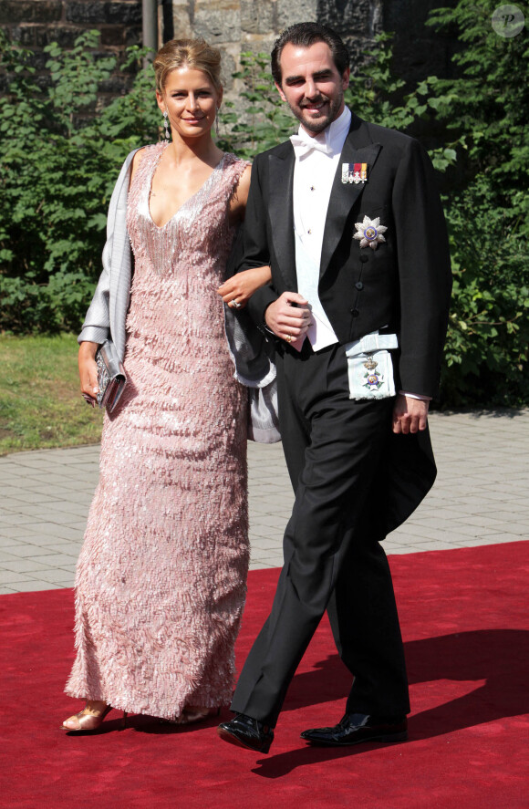 Le prince Nikolaos de Grèce et son épouse Tatiana Blatnik arrivent au mariage religieux de la princesse Nathalie de Sayn-Wittgenstein-Berleburg et d'Alexander Johannsmann à l'église évangélique du château de Bad Berleburg, Allemagne, le 18 juin 2011. Le couple s'est marié civilement le 27 mai 2010. Photo par Albert Nieboer/DPA/ABACAPRESS.COM