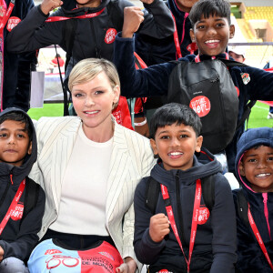 Ici, la princesse pose avec les joueurs indiens - Le prince Albert II de Monaco et la princesse Charlene de Monaco ont assisté aux phases finales du 12eme Tournoi Sainte Devote et remis la coupe au vainqueur, l'Afrique du Sud, au stade Louis II de Monaco, le 20 avril 2024.