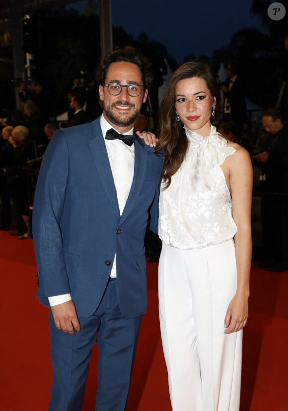 Thomas Hollande et sa femme Emilie Broussouloux - Montée des marches du film "R.M.N." lors du 75ème Festival International du Film de Cannes, le 21 mai 2022. © Dominique Jacovides / Bestimage