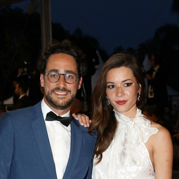 Thomas Hollande et sa femme Emilie Broussouloux - Montée des marches du film "R.M.N." lors du 75ème Festival International du Film de Cannes, le 21 mai 2022. © Dominique Jacovides / Bestimage