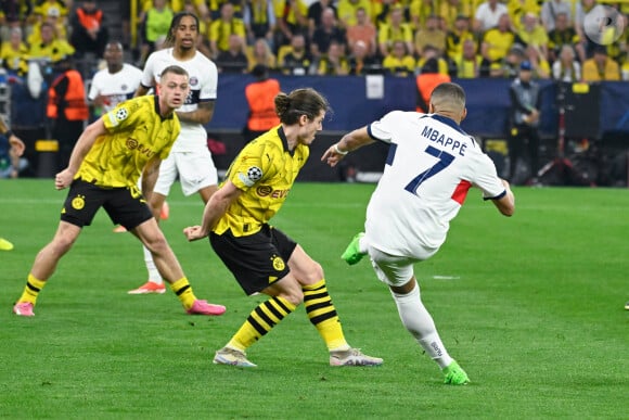 A savoir le match opposant le PSG de Kylian Mbappé au Borussia Dortmund, ce soir 21h.
Kylian Mbappe lors de Dortmund-PSG. ( Photo de federico pestellini / panoramic ) -