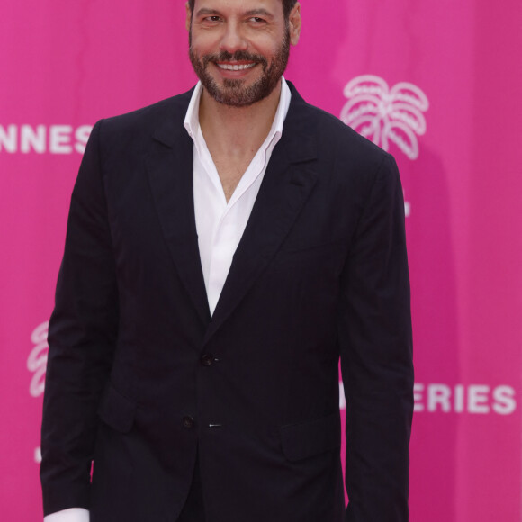 Laurent Lafitte pour la série "Tapie" - Photocall (tapis rose) du festival Canneseries saison 6 au palais des festivals à Cannes le 16 avril 2023. © Denis Guignebourg / Bestimage 